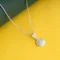 Classic Round Diamond Pendant P15 on table