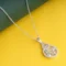 Crystal Blossom Circle Pendant Necklace P50 on table