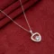 Diamond Pendant Necklace N62 on table
