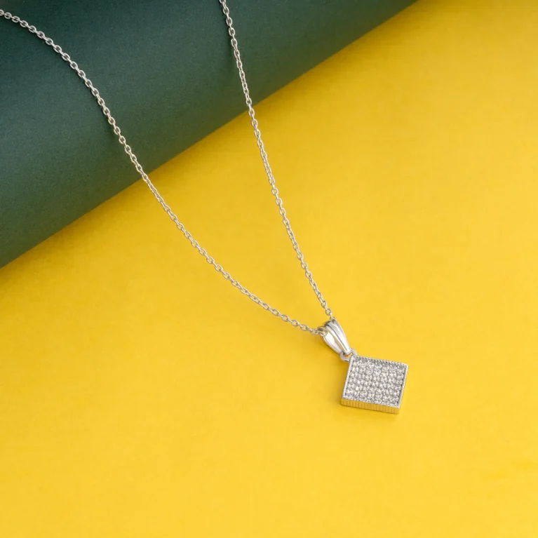 Kite - Cluster Pendant Necklace N8 on table