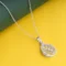 Leaf Illusion Diamond Pendant P51 on table