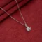 Link Heart Necklace P19 on table
