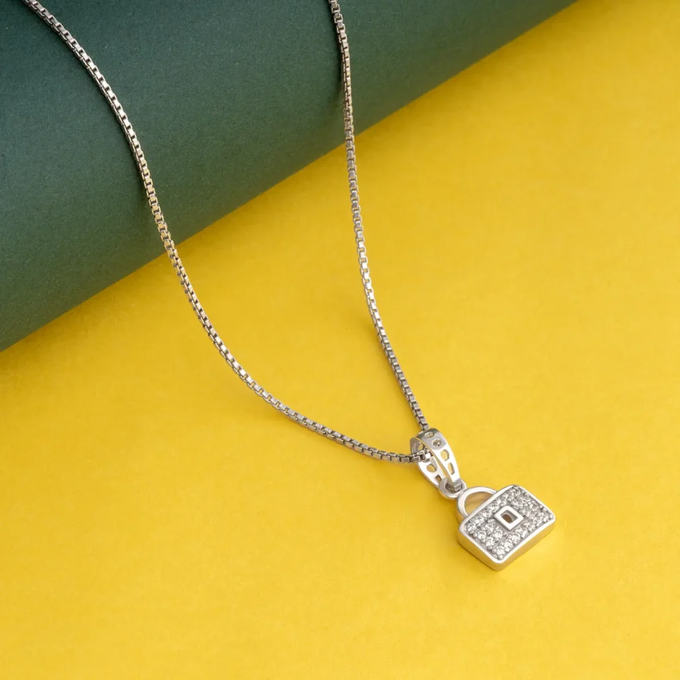 Lock Pendant Necklace P5 on table