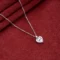 Love Pendant Necklace N27 on table