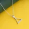 Minimalist Triangle Necklace N40 on table