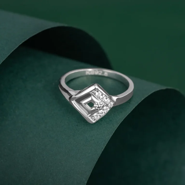 Nishav Jewellers 925 Sterling Silver Geometric Ring R 52 on table