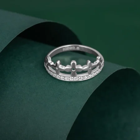 Queen’s Petal Crown Ring R 102 on table