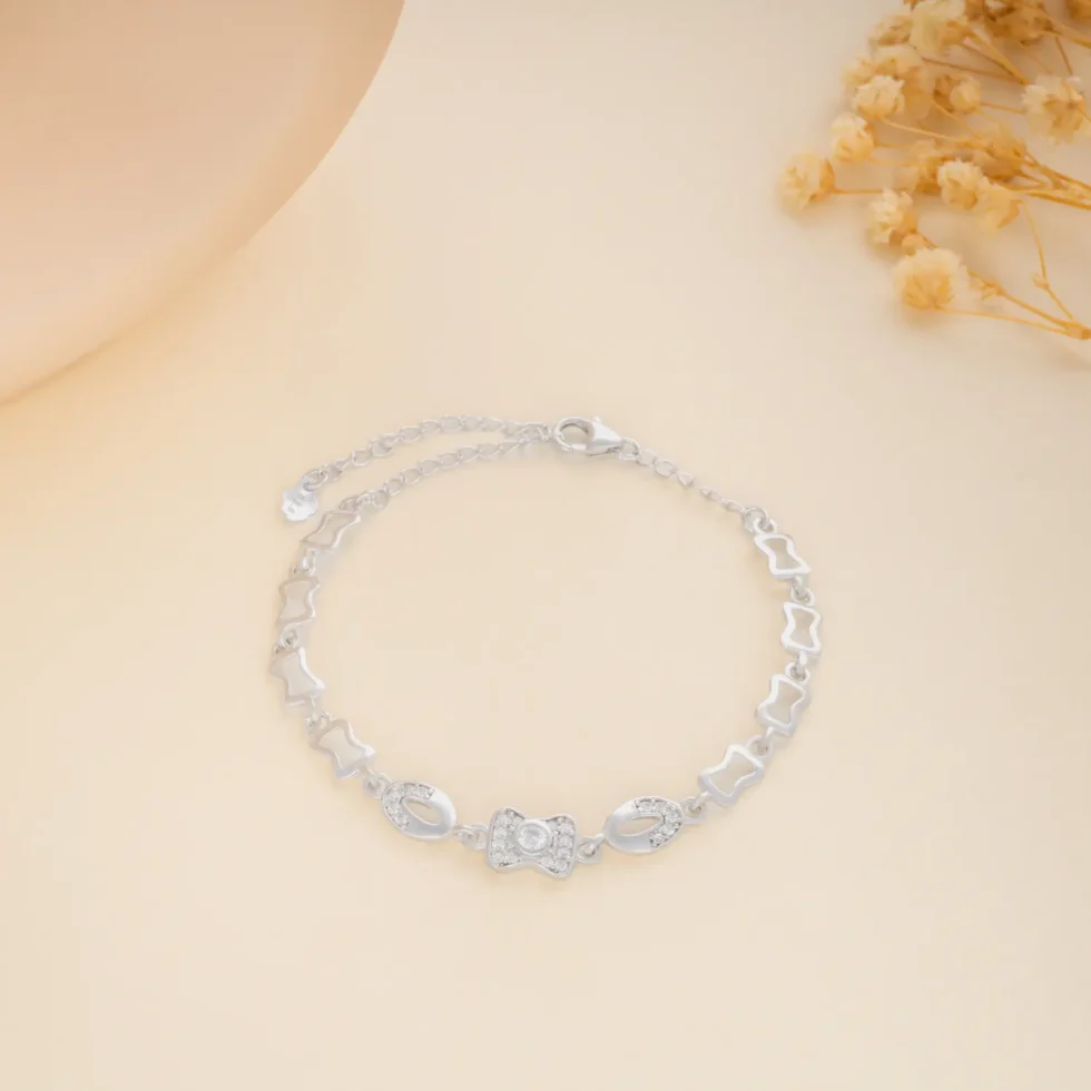 Ribbon Glow Bracelet B 112 M BKI on table 2