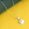 Round Diamond Pendant N4 on table