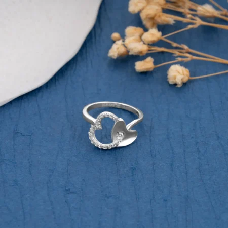 TwinHeart Curve Ring R 229 on table