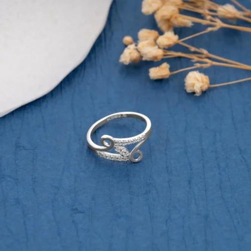 Twirl Diamond Ring R 174 on table